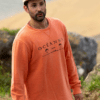 Sudadera sostenible, algodón orgánico, logo Oceanna, palmeras orange, ética