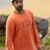 Sudadera sostenible, algodón orgánico, logo Oceanna, palmeras orange, ética