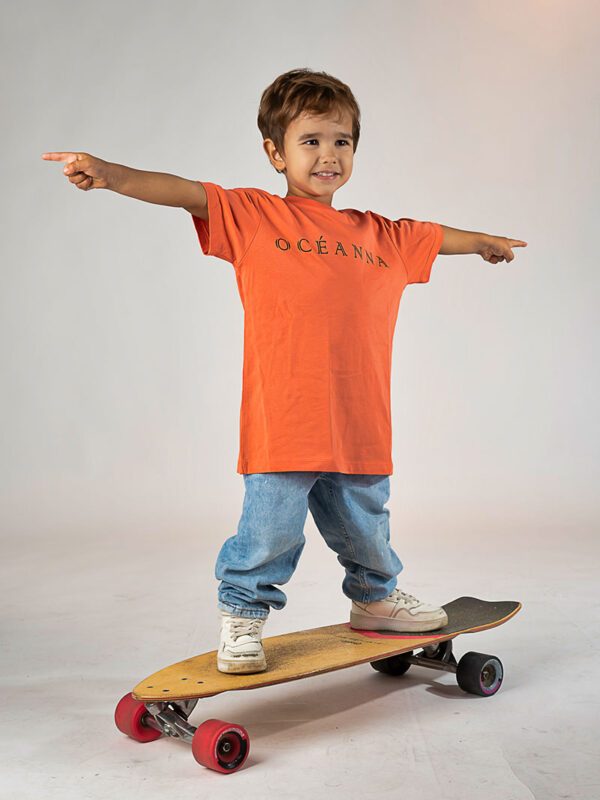 Camiseta infantil sostenible Océanna Fiesta en naranja